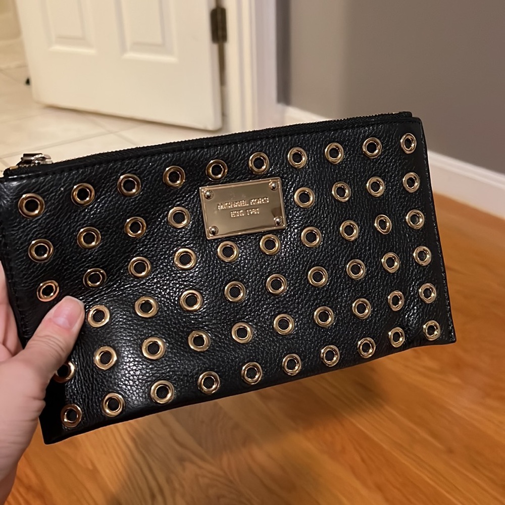Michael Kors black and gold wristlet